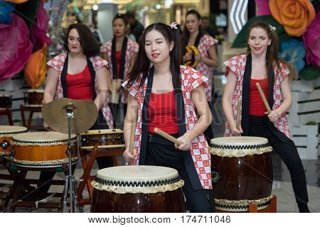 Moscow, Russia - March 5, 2017: Group Of Japanese Taiko Drummers Girls Perform In 
