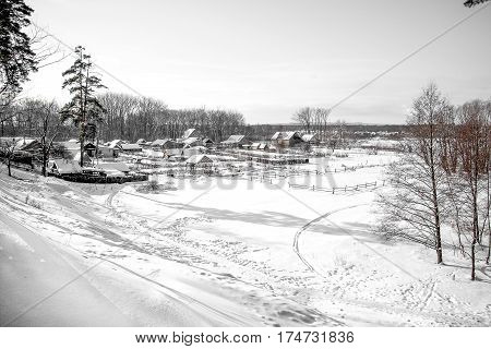 Snowy hills in Russian countryside in morning