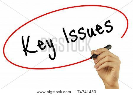 Man Hand Writing Key Issues With Black Marker On Visual Screen. Isolated On White Background. Busine