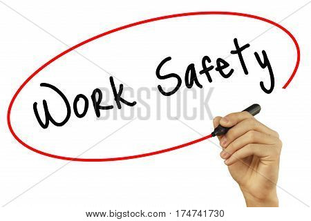 Man Hand Writing Work Safety With Black Marker On Visual Screen. Isolated On Grey. Business, Technol
