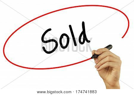 Man Hand Writing Sold With Black Marker On Visual Screen. Isolated On Background. Business, Technolo