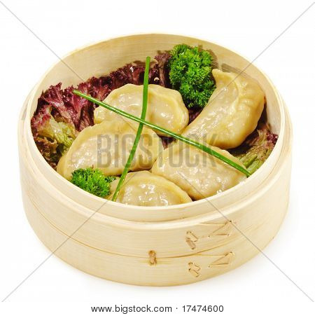 Japansk køkken - svinekød Dumplings i Bast kurv med salat blade