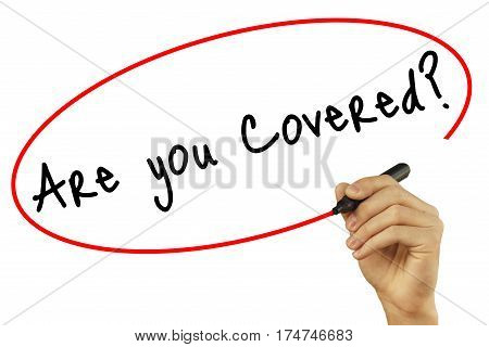 Man Hand Writing Are You Covered? With Black Marker On Visual Screen. Isolated On White Background.