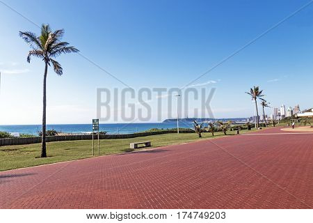 Red Paved Promenade On  Beachfront City Landscape