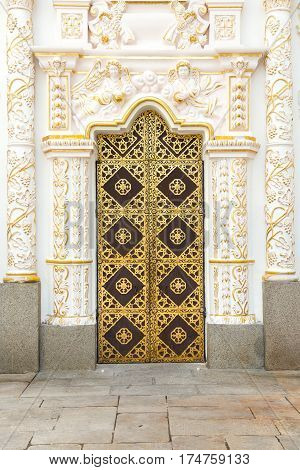 The door to the Cathedral of the Assumption of the Kiev-Pechersk Lavra. The famous monastery included in UNESCO world heritage