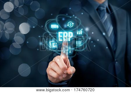 Enterprise resource planning ERP concept. Businessman click on ERP business management software button for collect store manage and interpret business data about customers HR production logistics financials and marketing.