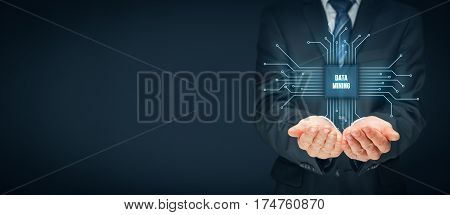 Data mining (data-minig) concept. Abstract symbol of a chip with text data mining connected with data represented by points.
