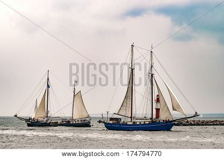 Rostock, Germany - August 2016: Sailing ships on the baltic sea. Hanse-Sail Warnemuende at port Rostock, Mecklenburg-Vorpommern, Germany. Tall Ship.Yachting and Sailing travel. Cruises and holidays
