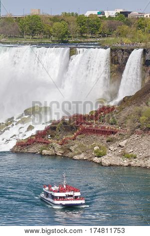 Beautiful Picture With A Ship And Amazing Niagara Waterfall