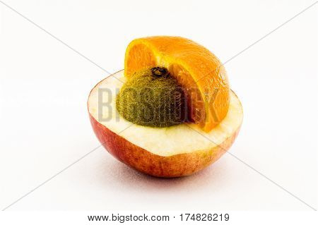 Composite fruit of apple kiwi and mandarin isolated on white background