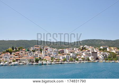 Skopelos island seaside coastline town with buildings typical greek view Greece