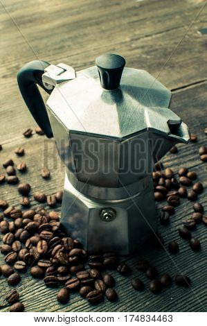 Silver geyser coffee maker. Device for kitchen.