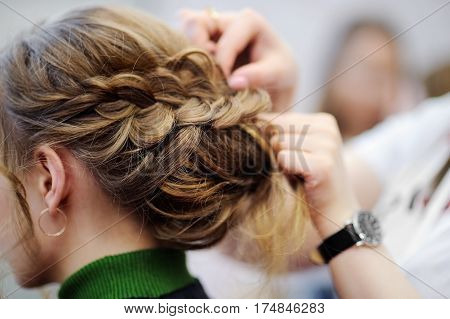 Young Woman Getting Her Hair Done Before Party