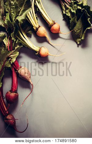 Mix Of Red And Gold Beets On Grey Background. Food Background. Concept Of Healthy Eating
