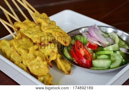 Pork Satay. grilled pork served with peanut sauce or sweet and sour sauce
