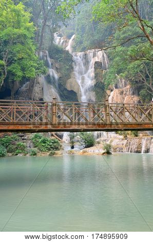 Steel And Wooden Bridge Cross Over And Looking For Take Photo Viewpoint Of Kuang Si Falls