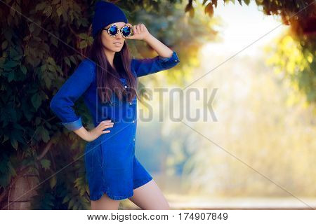 Street Style Fashion Girl Wearing a Blue Denim Romper