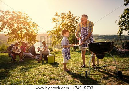 family weekend with barbecue in park