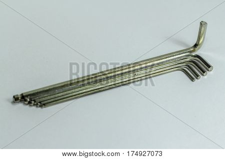 Hex key Set on white background.A hex key, Allen key or Allen wrench is a tool used to drive bolts and screws with hexagonal sockets in their heads.