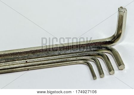 Hex key Set on white background.A hex key, Allen key or Allen wrench is a tool used to drive bolts and screws with hexagonal sockets in their heads.