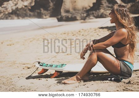 surfergirl is wating for the perfect wave