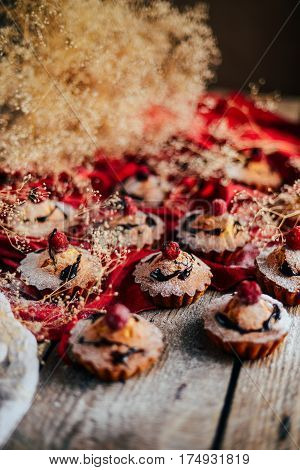 Delicious Chocolate Cupcakes With Berries On Wodeen Table, Top V