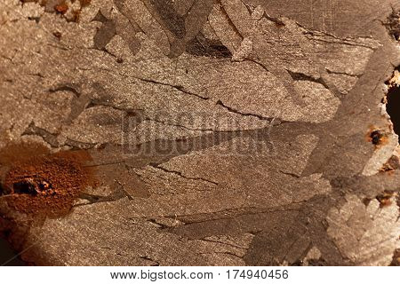 Macro photo of an iron meteorite with Widmanstaetten patterns.