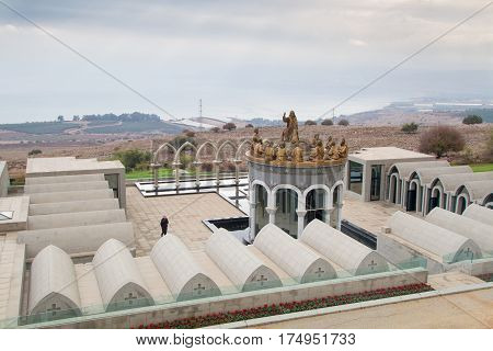 GALILEE ISRAEL - DECEMBER 3: The statues of Jesus and Twelve Apostles in Domus Galilaeae on the Mount of Beatitudes near the Sea of Galilee Israel on December 3 2016