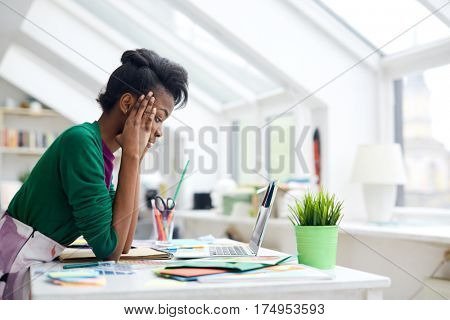 Self-employed designer or stylist concentrating on work