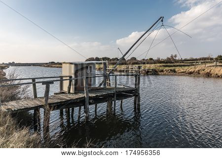 Fishing cabin on the bank of the river 
