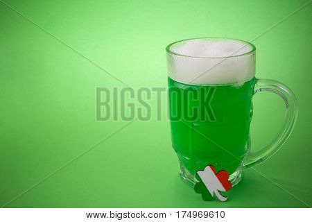 St Patrick's day green beer on a green light background