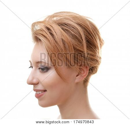 Young woman with trendy hairstyle on white background