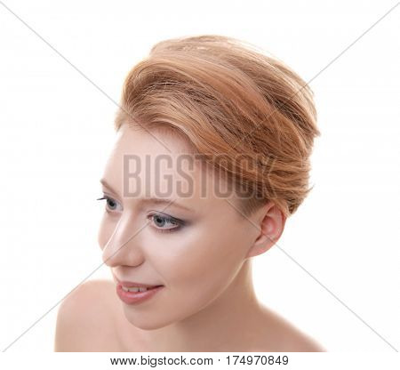Young woman with trendy hairstyle on white background