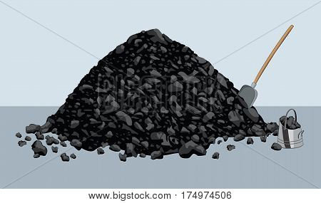Pile of coal with shovel and bucket