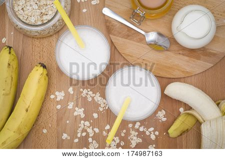 Milk shake with banana, oatmeal and honey, healthy breakfast