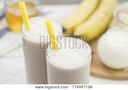 Milk shake with banana, oatmeal and honey, healthy breakfast