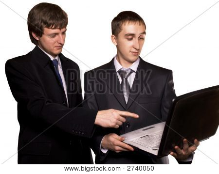 Uomini d'affari, lavorando su un computer portatile isolato