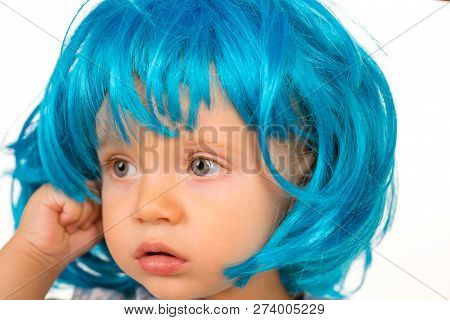 Funky Style Beauty. Cute Baby With Long Blue Hair. Small Child Wear Blue Wig Hair. Small Kid In Fanc
