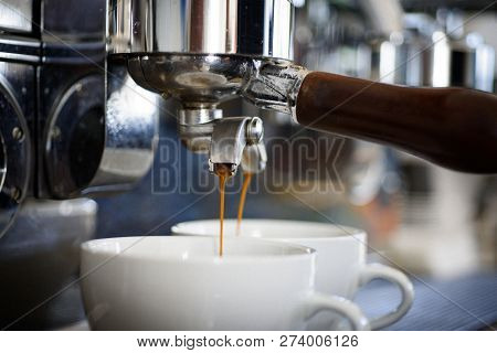 Relax While Your Drink Is Prepared. Coffee Cups. Small Cups To Serve Coffee Drinks. Coffee Being Bre