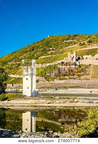 The Mouse Tower With Ehrenfels Castle On The Background. The Upper Middle Rhine Valley, Germany
