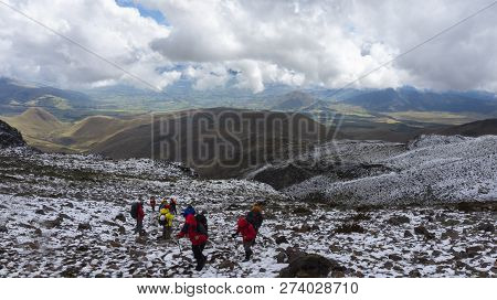 Iliniza, Cotopaxi / Ecuador - October 25 2014: Group Of Climbers Climbing The Sand In The Volcano Il