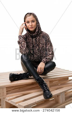 Young Blonde In Bomber And Leather Jeggings View