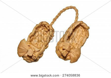 Old Russian Sandals Made From Bast On A White Background