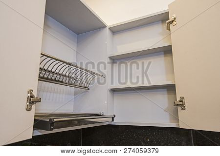 Interior Design Decor Of Kitchen In Luxury Apartment Showing Closeup Detail Of Sliding Plate Rack Cu