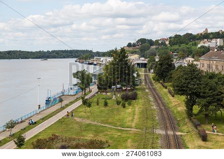 Belgrade, Serbia- 16 August 2014: Belgrade Cityscape From The Sava River. Railway Tracks At The Bank