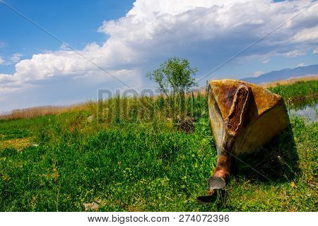 The Boat Upside Down On The Meadow