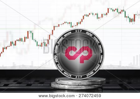 Counterparty (xcp) Cryptocurrency; Counterparty Coin On The Background Of The Chart
