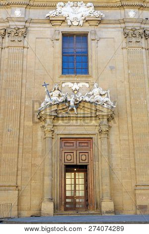 Sculptural Composition Over Entrance Door Of Complex Of San Firenze In Florence. Italy