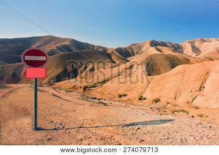 Stop-signal At The Middle Of Nowhere - In The Israel Desert. Landscape Of The Sunny Day, Sand Hills 