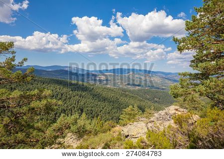 Beautiful Landscape With Blue Sky Clouds And Forest In Canencia Mountain Near Madrid